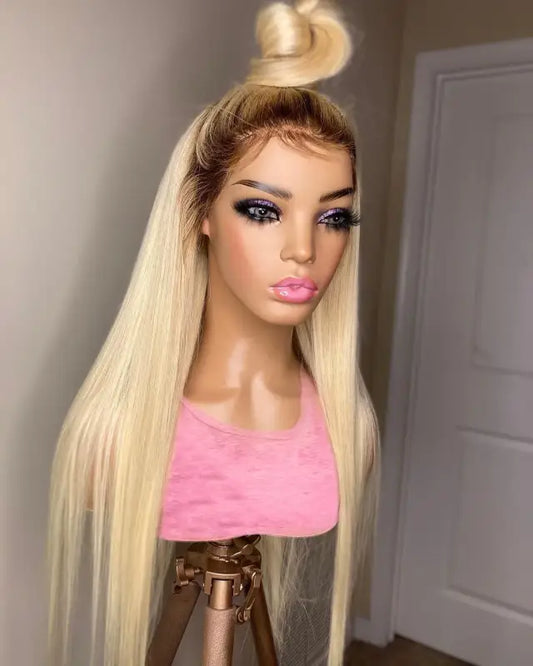 HD Transparent 13x4 straight honey blonde preplucked human hair lace front wig on mannequin.